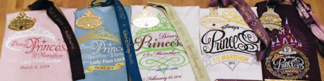 The past Princess Half-Marathon medals from runDisney