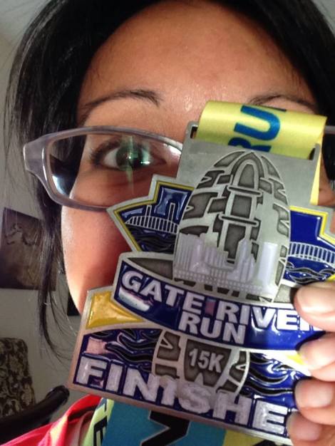 A silly photo of myself and my new medal.