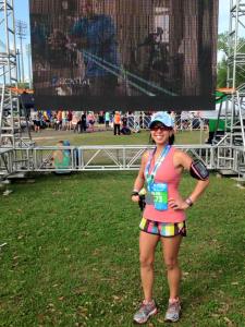 Posing in front of the Runners Village video wall